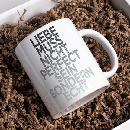 Tasse mit Spruch Positive Perspektiven: "Liebe muss nicht Perfect sein sondern echt" Kaffee Büro