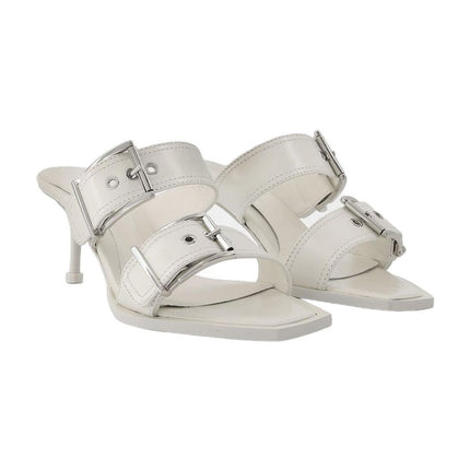 Pumps aus Leder in Elfenbein / Silber