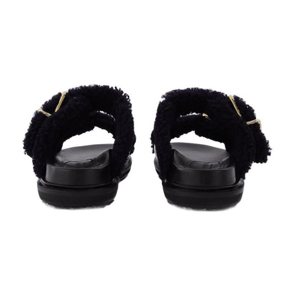 Slides Fussbett aus schwarzem Leder