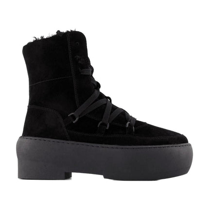 Chunky Sole Schnürstiefeletten aus schwarzem Leder