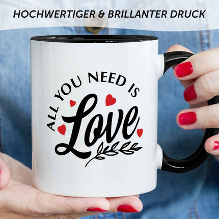 SEO. Bedruckte Tasse mit Spruch - All you need is love - Schwarz & Weiß Linkreich