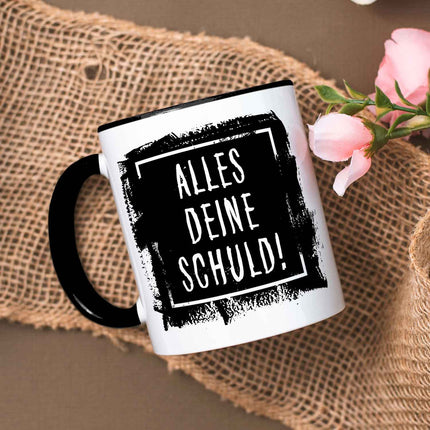 SEO. Bedruckte Tasse mit Spruch Alles Deine Schuld! - Schwarz & Weiß Linkreich