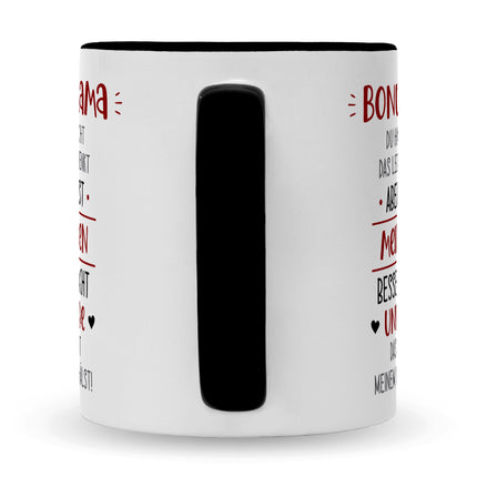 SEO. Bedruckte Tasse mit Spruch Bonus Eltern - Mama - Schwarz & Weiß Linkreich