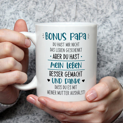 SEO. Bedruckte Tasse mit Spruch Bonus Eltern - Papa - Weiß Linkreich