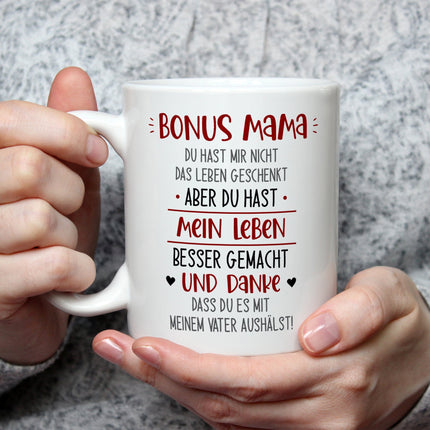 SEO. Bedruckte Tasse mit Spruch Bonus Eltern - Mama - Weiß Linkreich