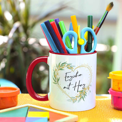 SEO. Bedruckte Tasse mit Spruch - Erzieher mit Herz - Rot Linkreich