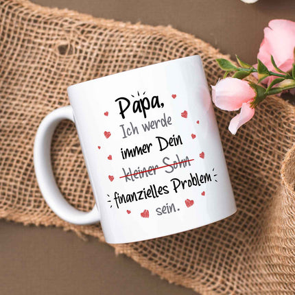 SEO. Bedruckte Tasse mit Spruch Finanzielle Belastung - Papa Sohn - Weiß Linkreich