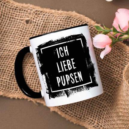 SEO. Bedruckte Tasse mit Spruch - "Ich Liebe Pupsen" - Schwarz & Weiß Linkreich
