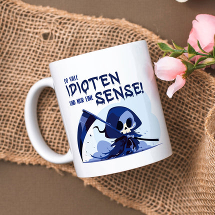 SEO. Bedruckte Tasse mit Spruch in blau - So viele Idioten und nur eine Sense - Weiß Linkreich
