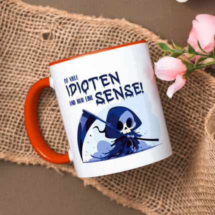 SEO. Bedruckte Tasse mit Spruch in blau - So viele Idioten und nur eine Sense - Orange Linkreich