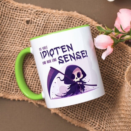 SEO. Bedruckte Tasse mit Spruch in lila - So viele Idioten und nur eine Sense - Hellgrün Linkreich