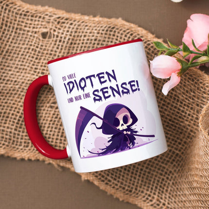 SEO. Bedruckte Tasse mit Spruch in lila - So viele Idioten und nur eine Sense - Rot Linkreich