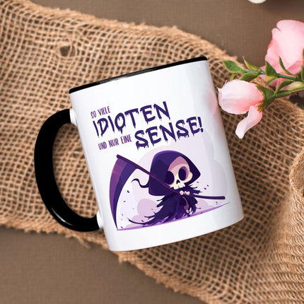 SEO. Bedruckte Tasse mit Spruch in lila - So viele Idioten und nur eine Sense - Schwarz & Weiß Linkreich
