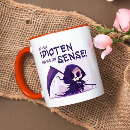 SEO. Bedruckte Tasse mit Spruch in lila - So viele Idioten und nur eine Sense - Orange Linkreich