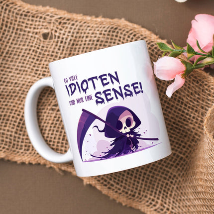 SEO. Bedruckte Tasse mit Spruch in lila - So viele Idioten und nur eine Sense - Weiß Linkreich