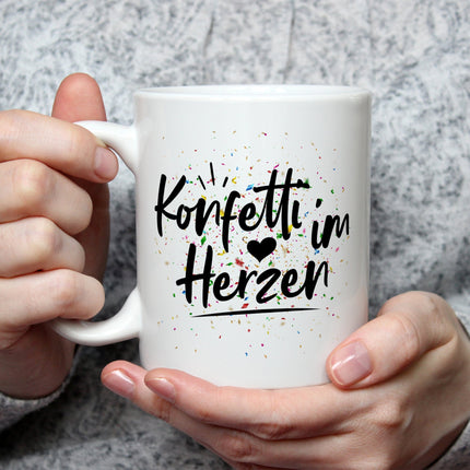 SEO. Bedruckte Tasse mit Spruch Konfetti im Herzen - Schwarz & Weiß Linkreich