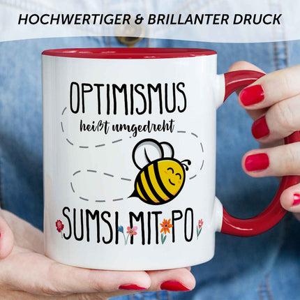 SEO. Bedruckte Tasse mit Spruch - Optimismus heißt umgedreht Sumsi mit Po - Rot Linkreich