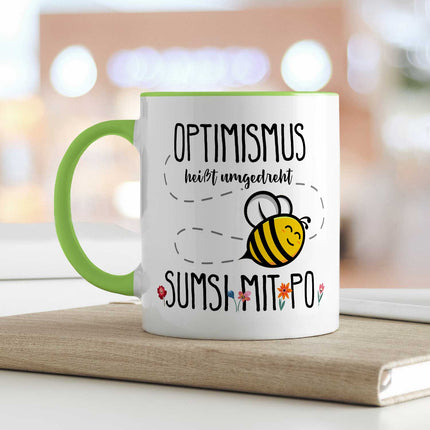 SEO. Bedruckte Tasse mit Spruch - Optimismus heißt umgedreht Sumsi mit Po - Grün Linkreich
