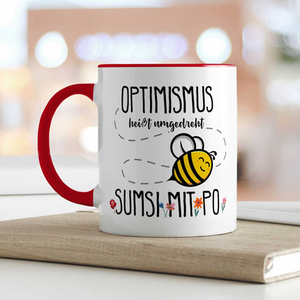SEO. Bedruckte Tasse mit Spruch - Optimismus heißt umgedreht Sumsi mit Po - Rot Linkreich
