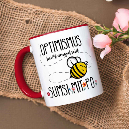 SEO. Bedruckte Tasse mit Spruch - Optimismus heißt umgedreht Sumsi mit Po - Rot Linkreich