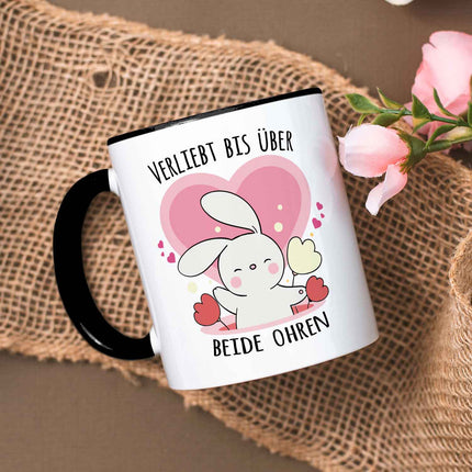 SEO. Bedruckte Tasse mit Spruch - Verliebt bis über beide Ohren - Schwarz & Weiß Linkreich