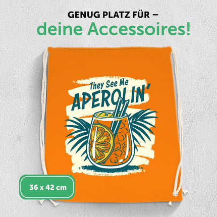 SEO. Farbiger Turnbeutel mit DTF - Druck - They see me Aperolin - Linkreich