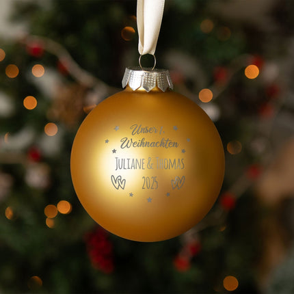 SEO. Gravierte Weihnachtskugel - Unser erstes Weihnachten für Paare - Gold (matt) Linkreich