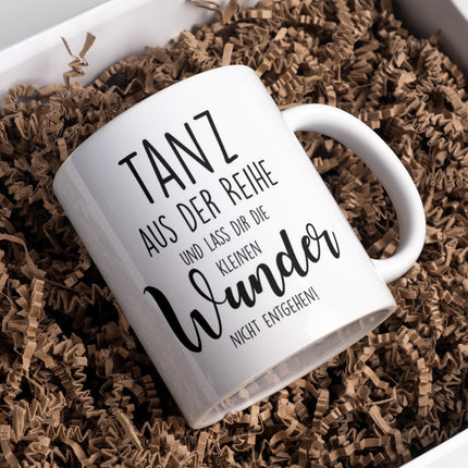 SEO. Tasse mit Spruch Positive Perspektiven: "Tanz aus der Reihe und lass dir die kleinen Wunder nicht entgehen" Kaffee Büro - Linkreich